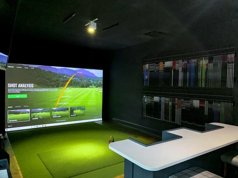 Indoor golf simulator studio set up for performance analysis and coaching
