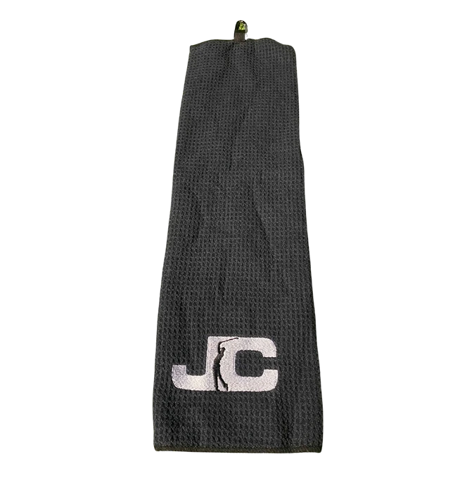 JC Golf Studio microfibre golf towel in black folded with embroidered JC logo – Queensland golf accessory